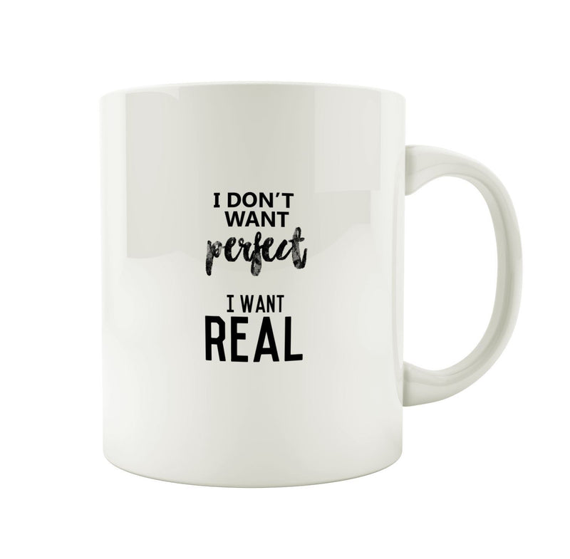 Porslinsmugg med texten "I dont want perfect. I want real"