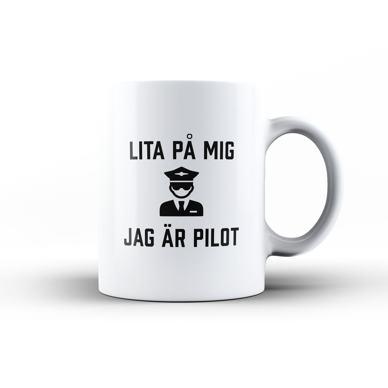 Porslinsmugg med texten "Lita på mig jag är pilot"
