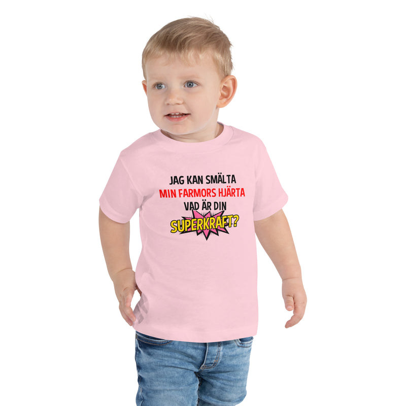 T-shirt för barn med texten - "Jag kan smälta farmors hjärta, vad är din superkraft?"