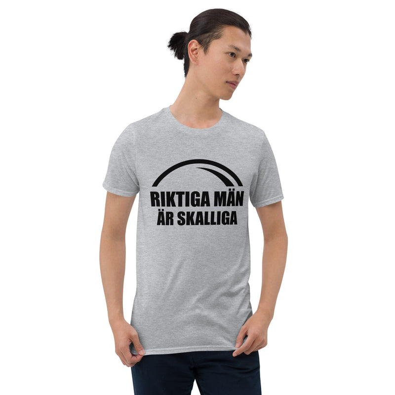 Kortärmad t-shirt i unisex-modell med texten - Riktiga män