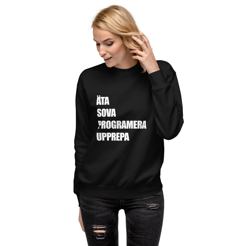 Sweatshirt med texten "ÄTA SOVA PROGRAMERA UPPREPA"
