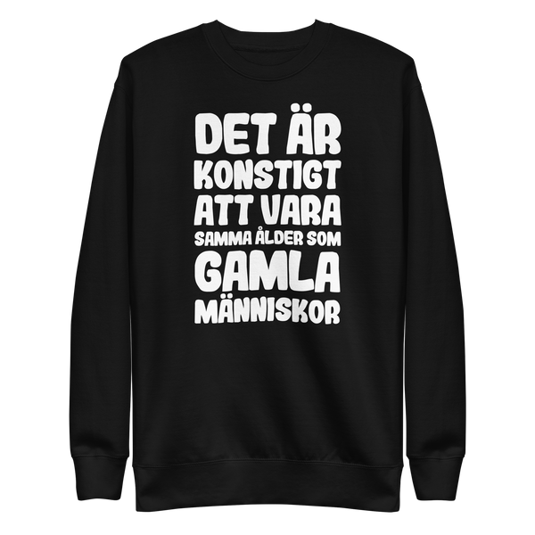 Sweatshirt med texten "Det är konstigt"