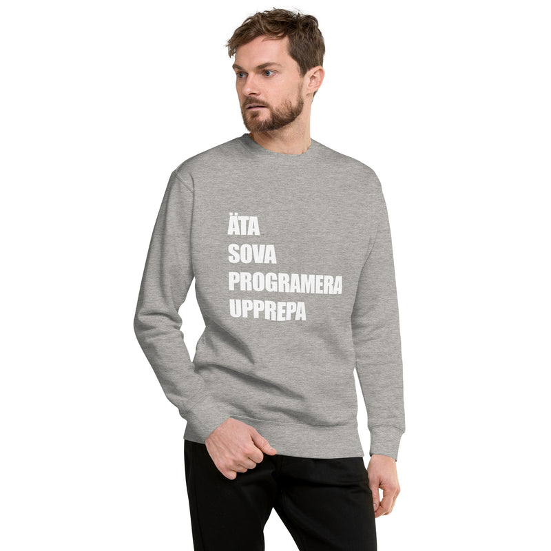 Sweatshirt med texten "ÄTA SOVA PROGRAMERA UPPREPA"
