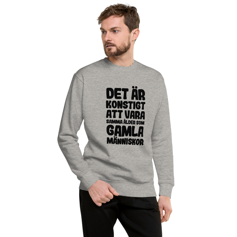 Sweatshirt med texten "Det är konstigt"