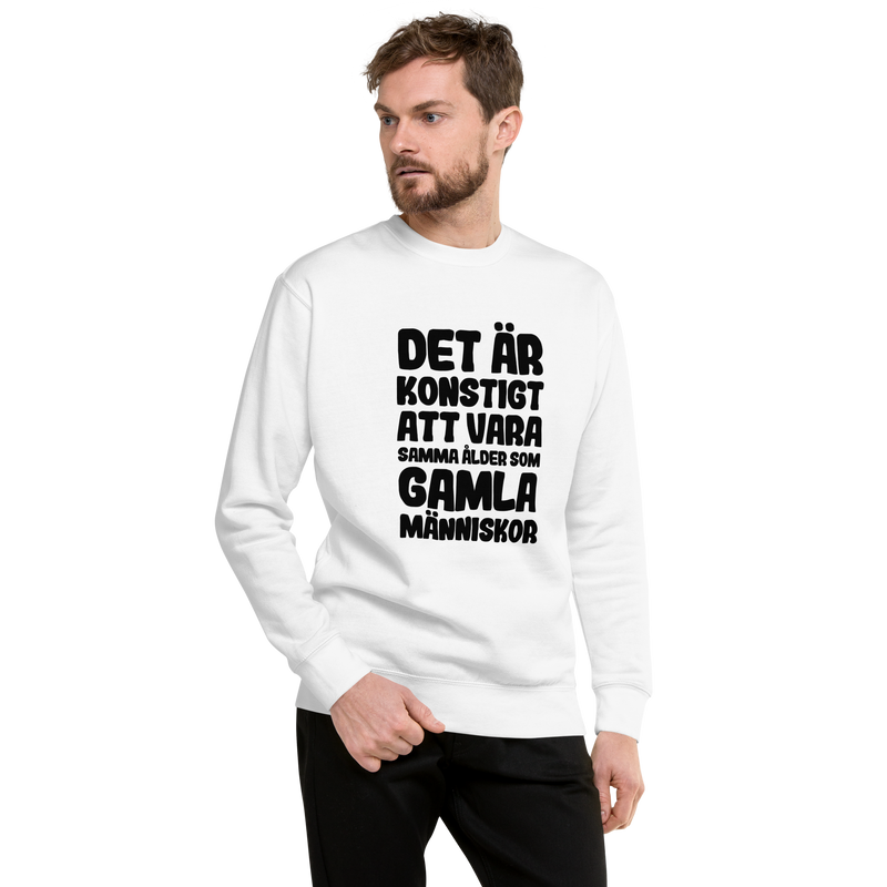 Sweatshirt med texten "Det är konstigt"
