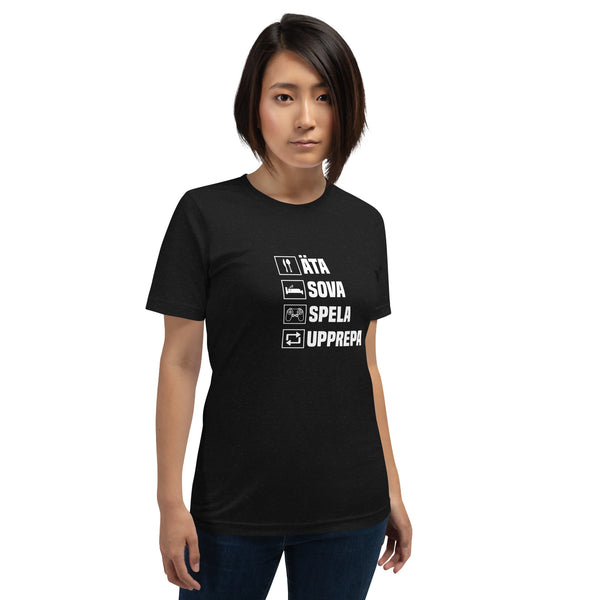 T-shirt med texten "Äta, sova, spela, upprepa"
